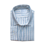 a product shot of a neatly folded blue and white stripe shirt on white background