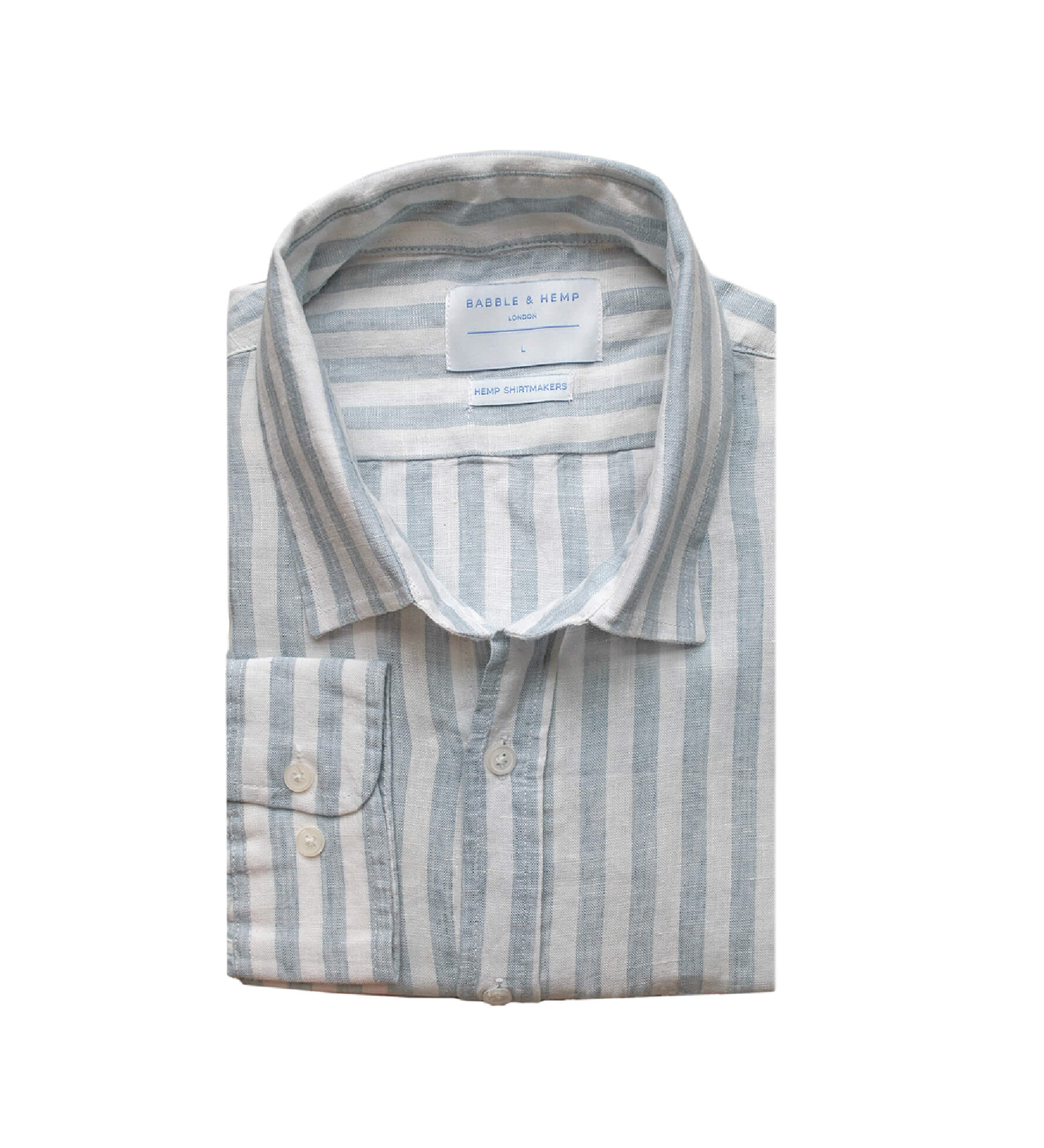 Folded blue and white striped hemp fabric shirt with a label on a white background