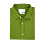 Product shot of folded green hemp shirt with a label on a white background