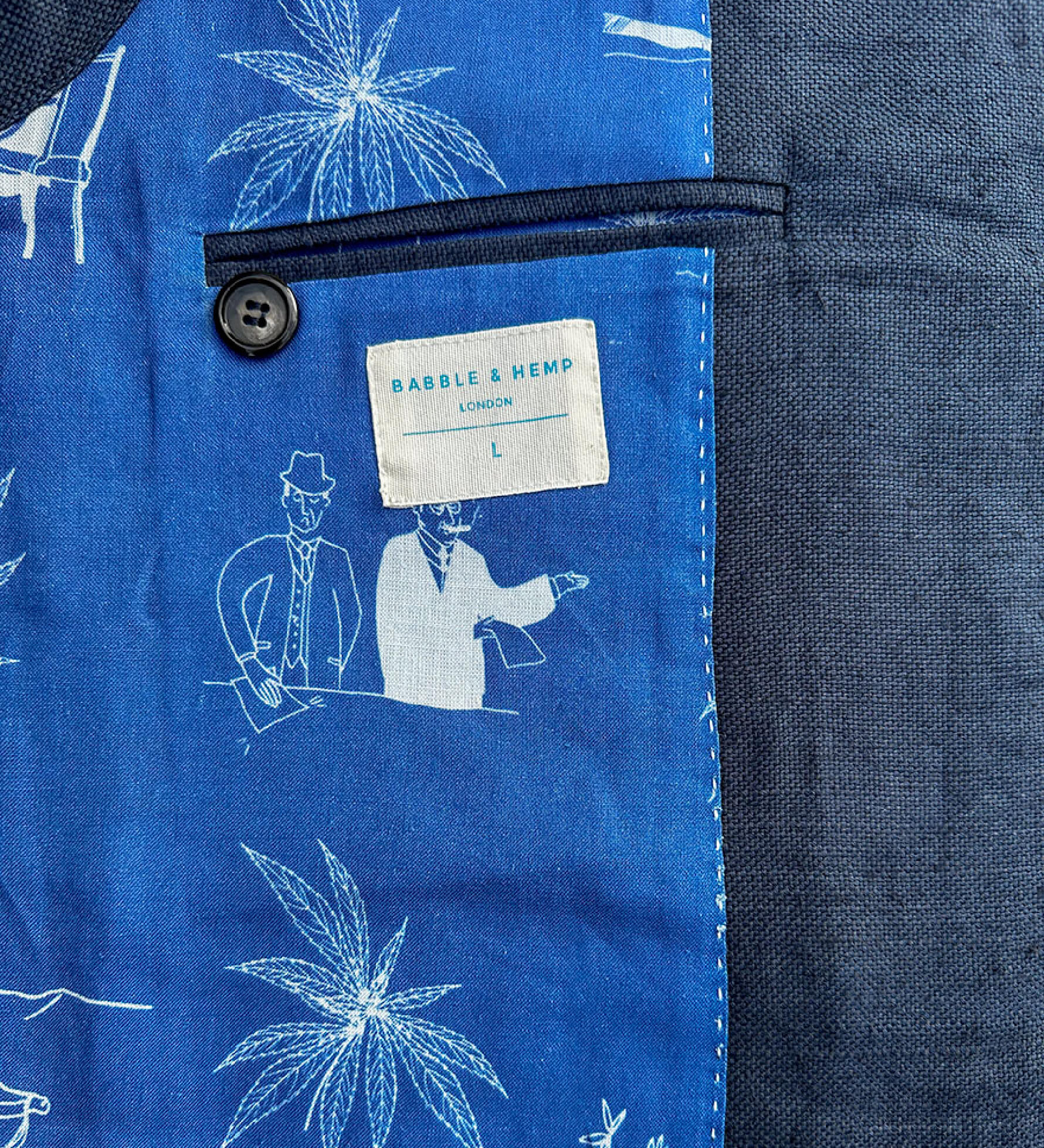 Close-up of interior lining showing blue fabric with white patterns and a brand label.