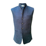 Navy blue coloured hemp fabric sleeveless nehru jacket standing on a mannequin with buttons on a white background