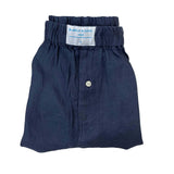 Navy blue hemp boxer shorts with a button on a white background