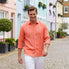 man wears coral hemp shirt whilst doing up cuffs