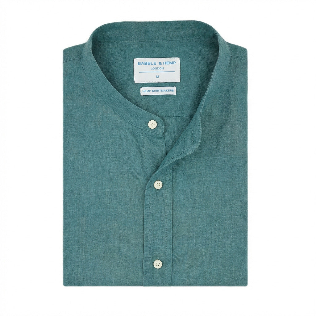 Teal hemp grandad collar shirt with buttons on a white background