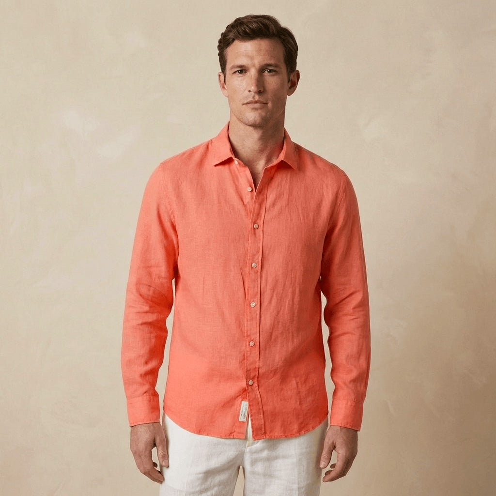 Man wearing a coral hemp shirt against a beige background