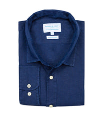 Folded blue shirt with a visible brand label on a white background