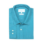 Folded turquoise hemp shirt with a visible brand label on a white background