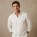 Man wearing a white hemp fabric shirt against a beige background