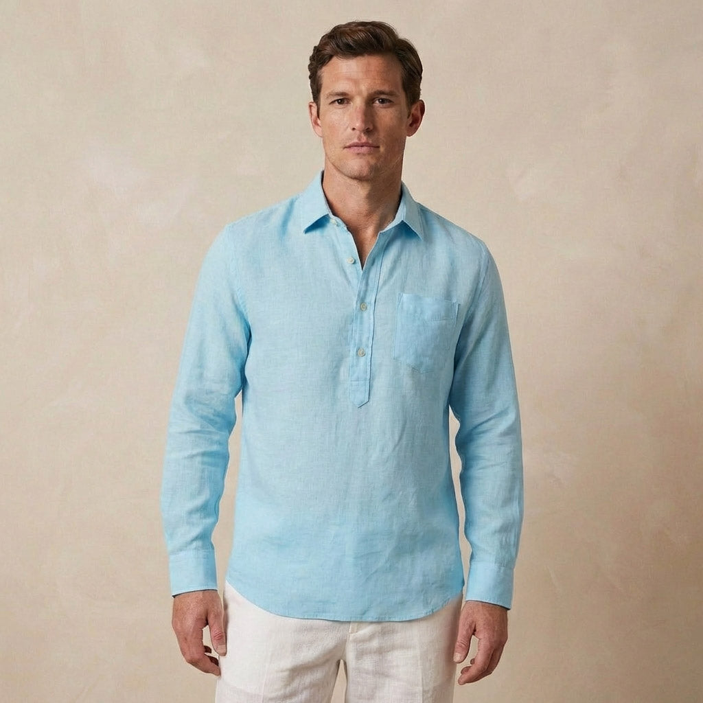 Man wearing a light blue long-sleeve hemp shirt against a beige background