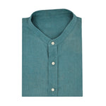 Neatly folded teal shirt made from eco-friendly hemp fabric and with small mandarin collar on a white background