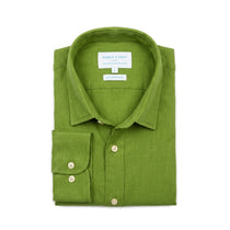 A folded green hemp shirt by Babble & Hemp, featuring a classic collar, button-down front, and a single-button cuff, displayed on a clean white background.
