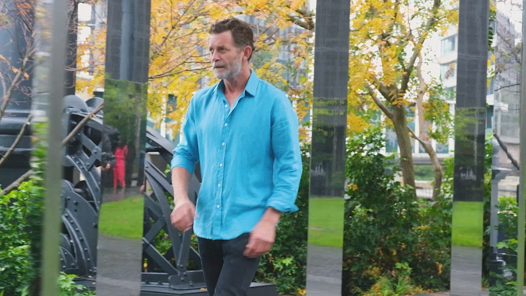 a video of a man wearing a blue hemp shirt
